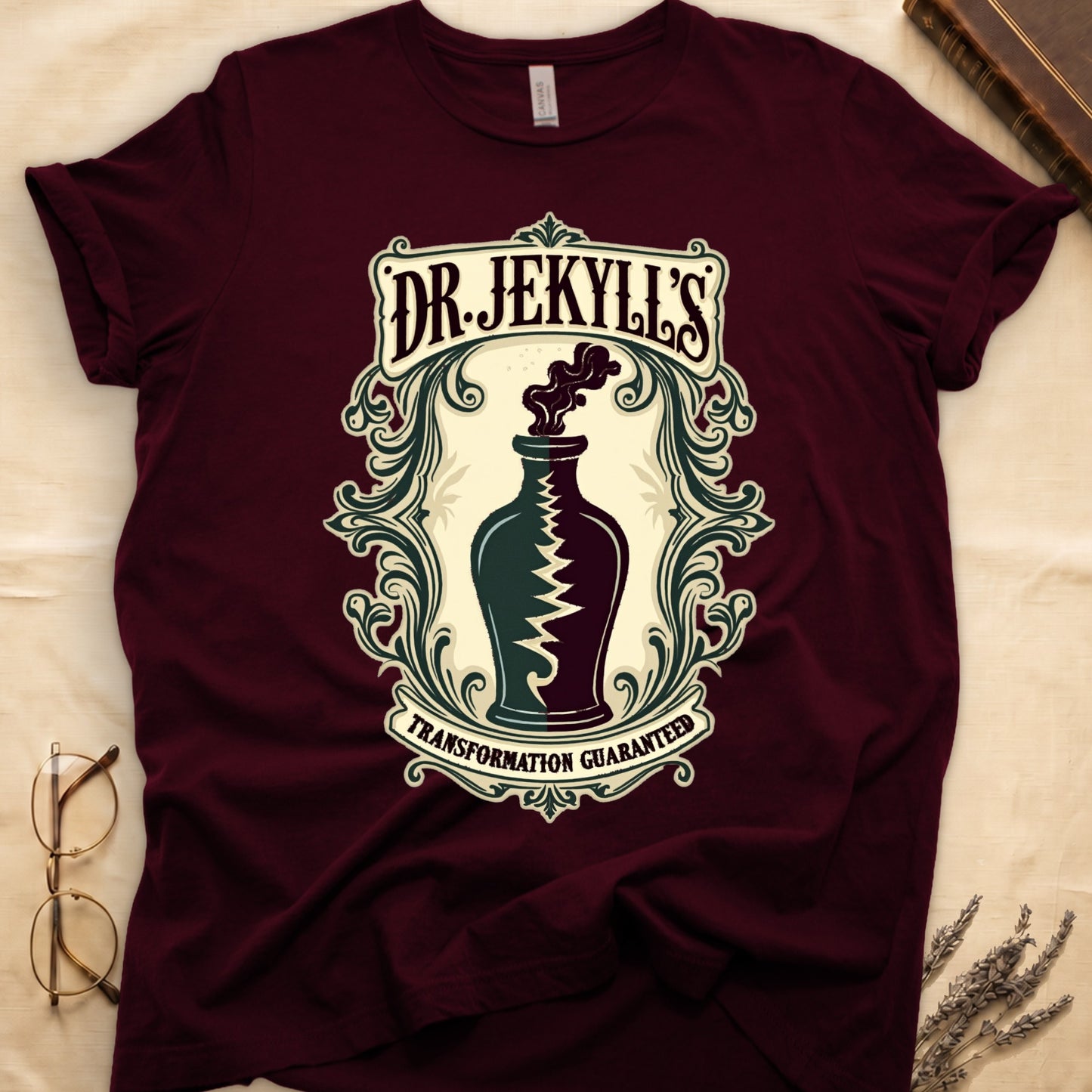 Maroon tee with apothecary label, green elixir bottle, lightning bolt, smoke, "DR. JEKYLL'S," "TRANSFORMATION GUARANTEED."