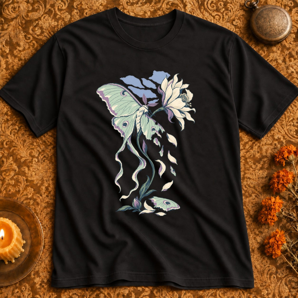 Black t-shirt with a mint green luna moth and white flower design.