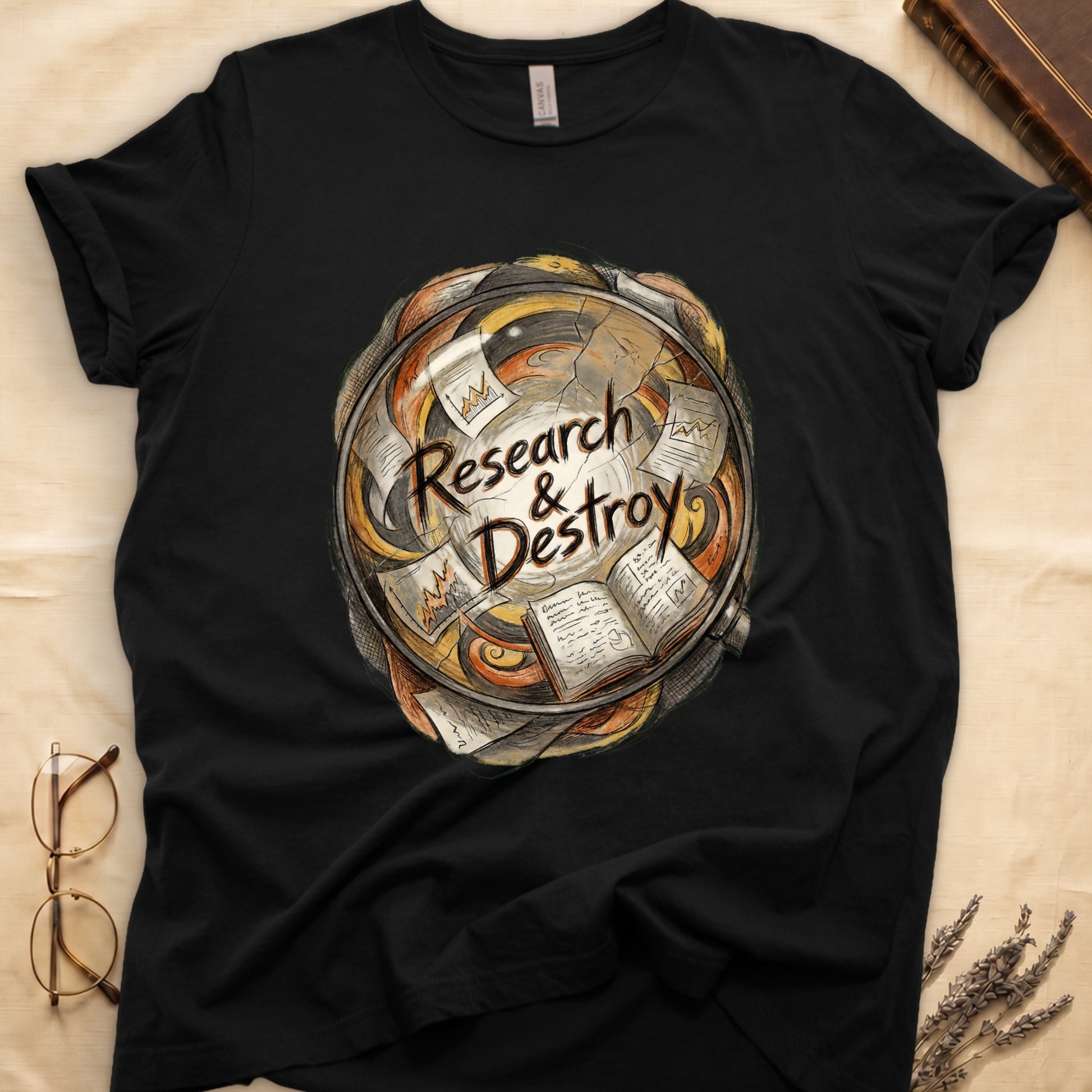Black tee with globe of papers, open books, charts in colored ink, "Research & Destroy" in cursive at center.