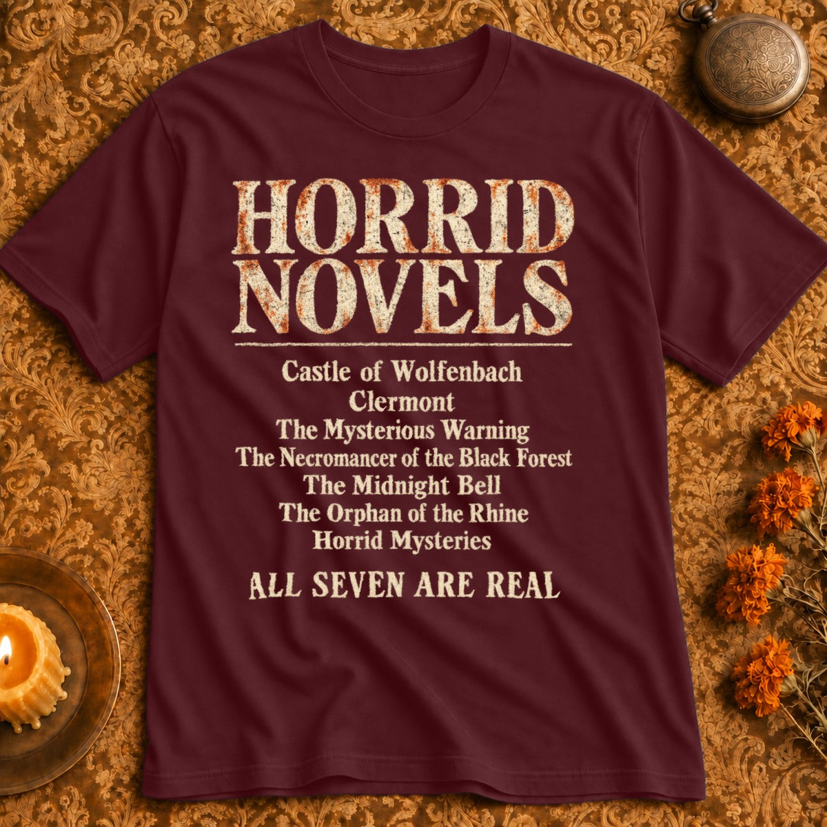 Maroon t-shirt with "Horrid Novels" and a list of seven titles, "ALL SEVEN ARE REAL".
