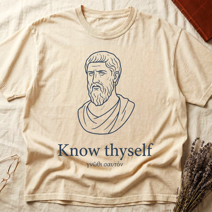 Ivory tee with classical Greek philosopher bust in white linework, "Know thyself" in cream serif below.