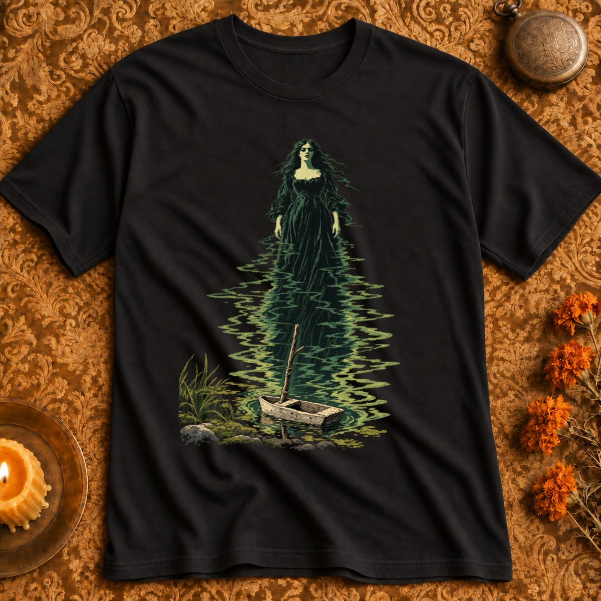Black t-shirt with a dark illustration of a woman in a long dress in watery reeds.