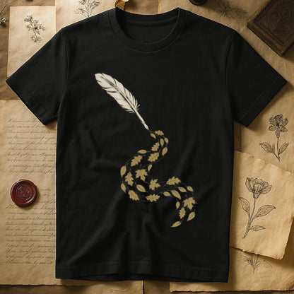 Black tee with antique quill pen in cream linework, oak and maple leaves cascading from the nib in gold and green.