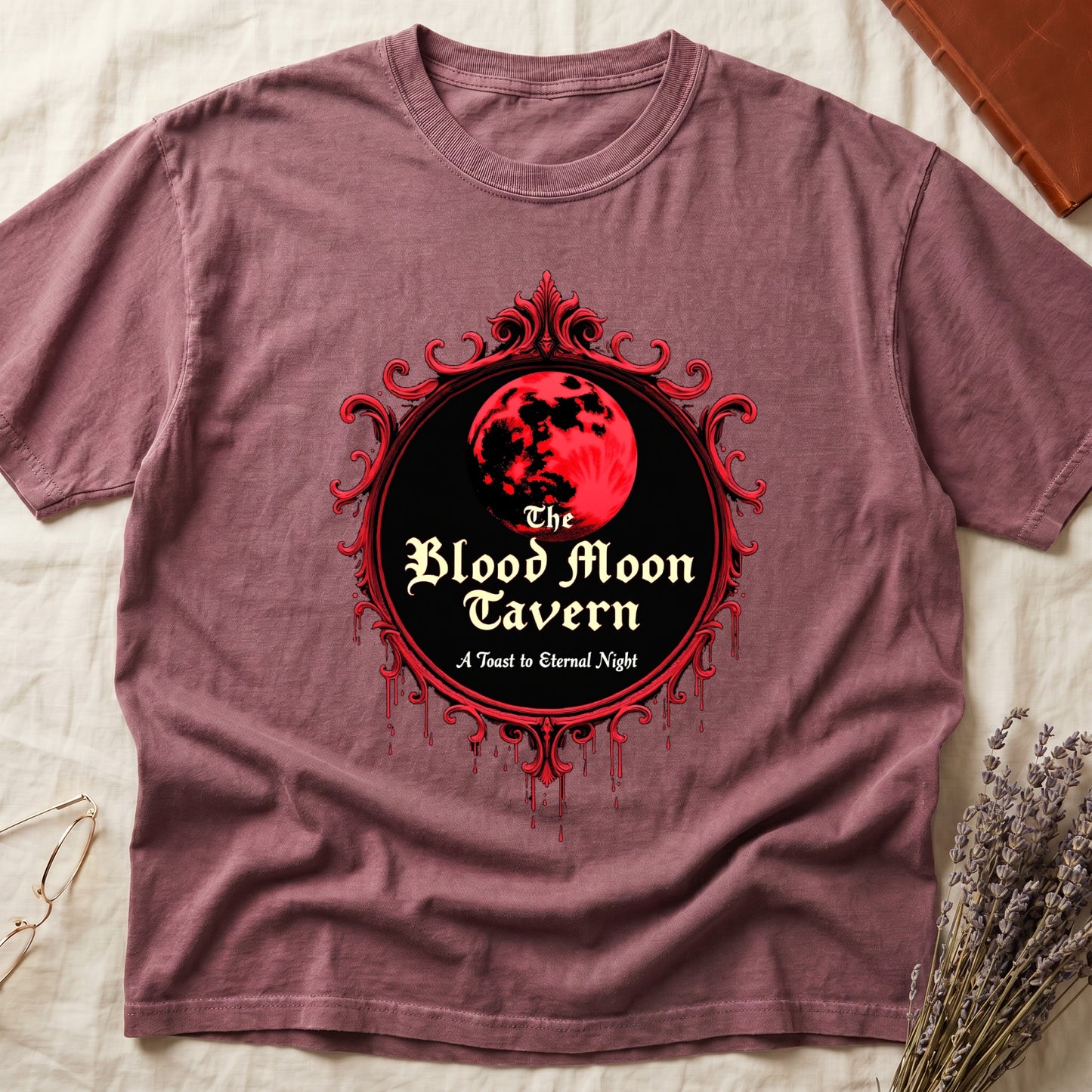 Dark Rose tee with red oval frame, blood-red moon, "The Blood Moon Tavern," "A Toast to Eternal Night," red drips below.