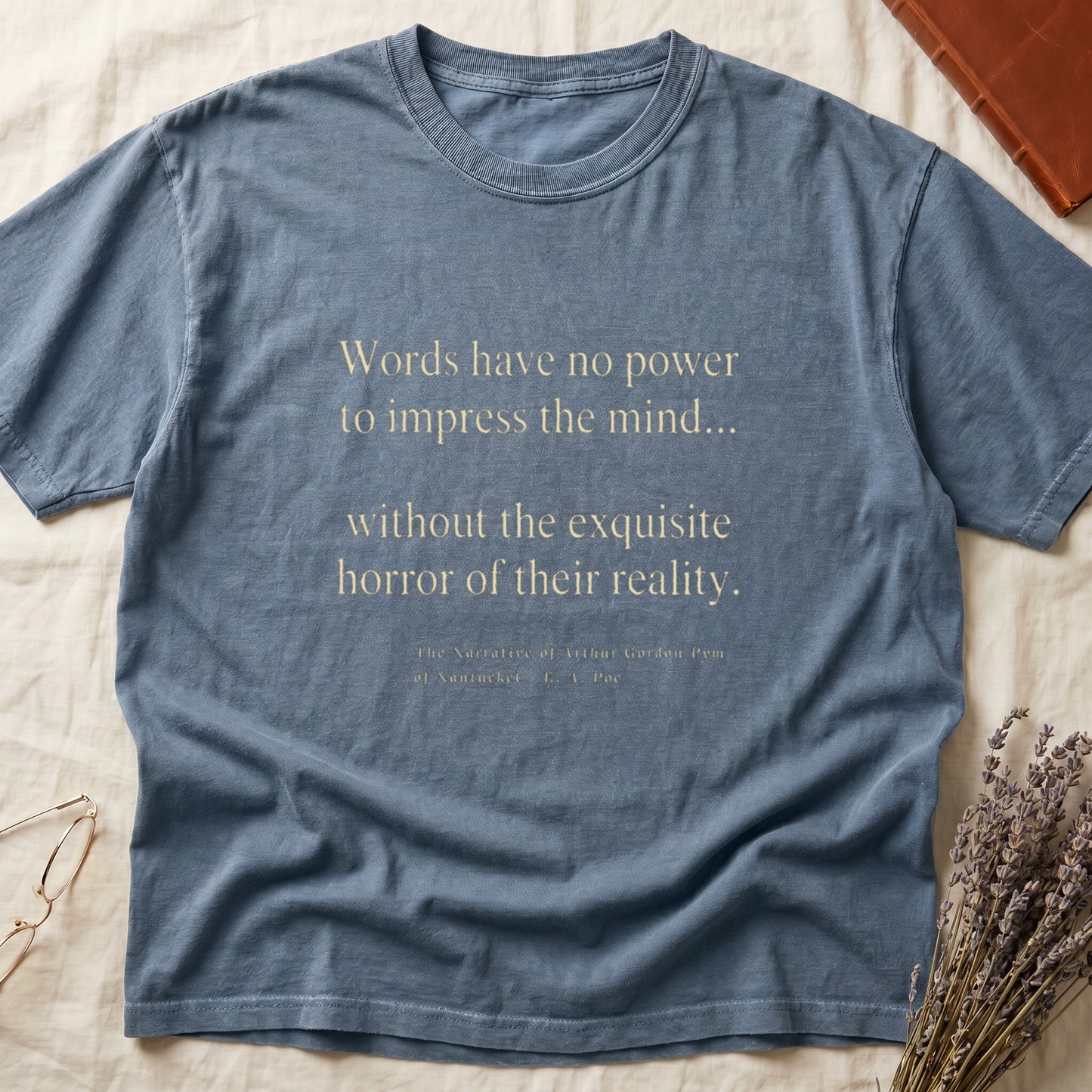 Blue t-shirt with quote from "The Narrative of Arthur Gordon Pym".