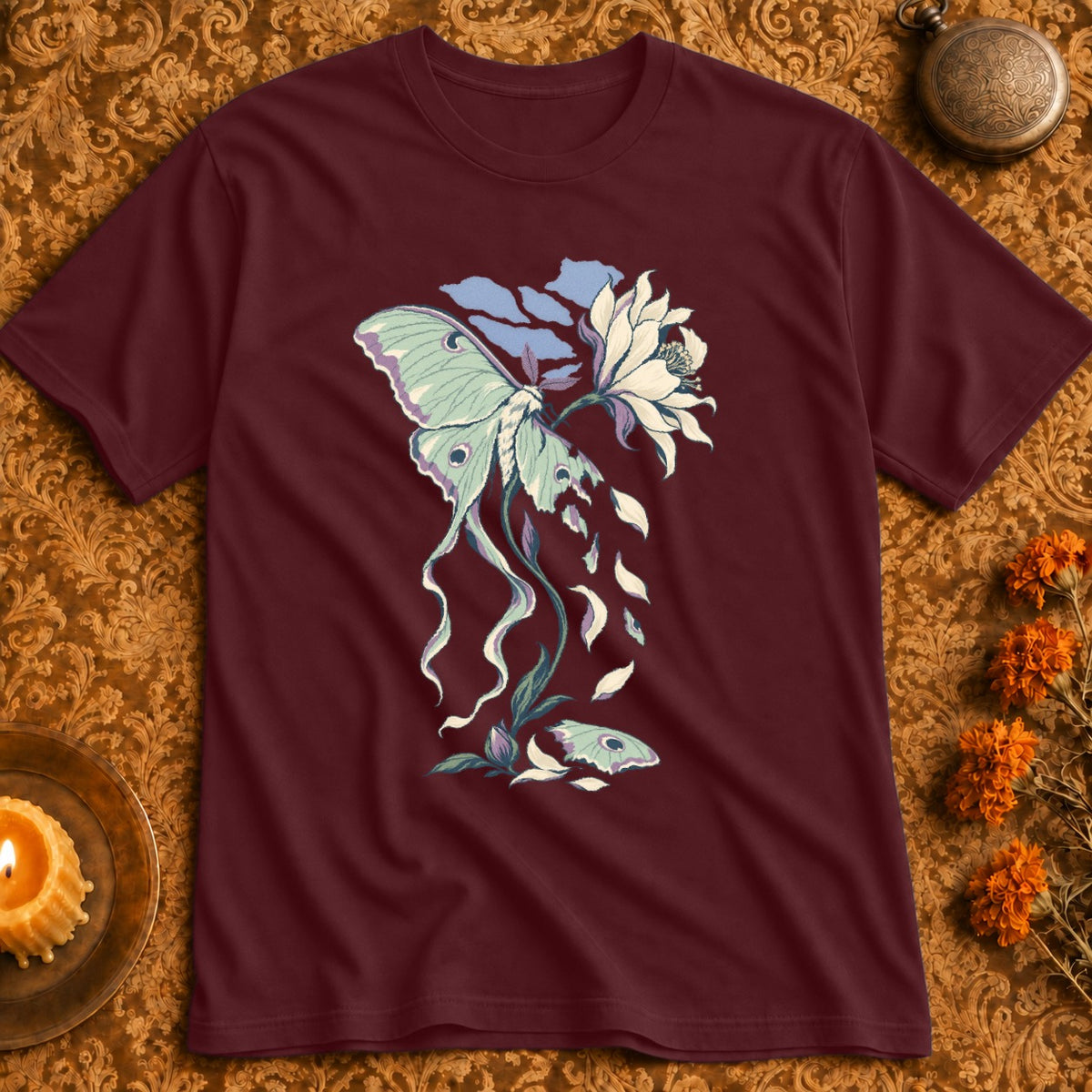 Maroon t-shirt with a white luna moth and flower illustration.