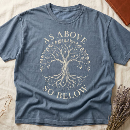 Blue Jean tee with Tree of Life in cream linework, mirrored canopy and roots, "AS ABOVE" and "SO BELOW" in serif arcs.