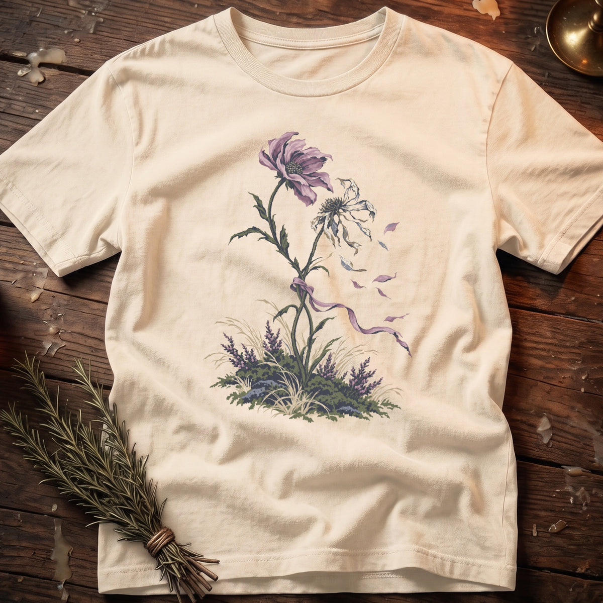 Cream t-shirt with faded purple and white flowers and greenery design.