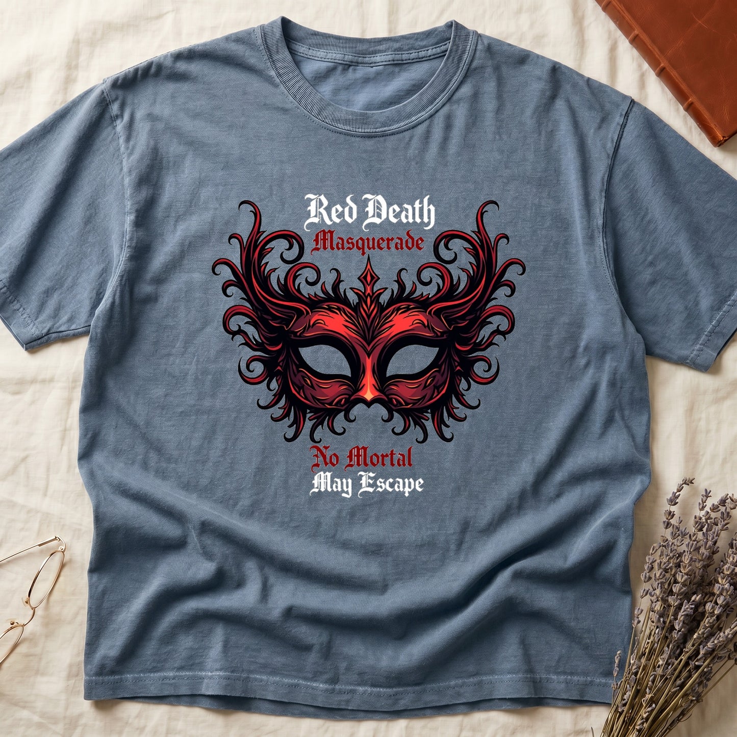 Blue Jean tee with ornate red masquerade mask, flame scrollwork, "Red Death Masquerade" top, "No Mortal May Escape" below.