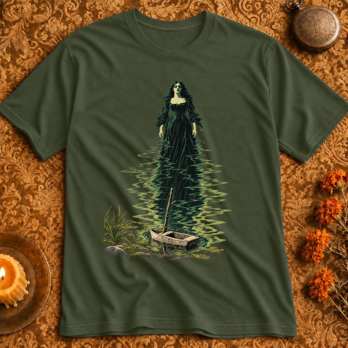 Green t-shirt with a dark illustration of a woman in water and a small boat.