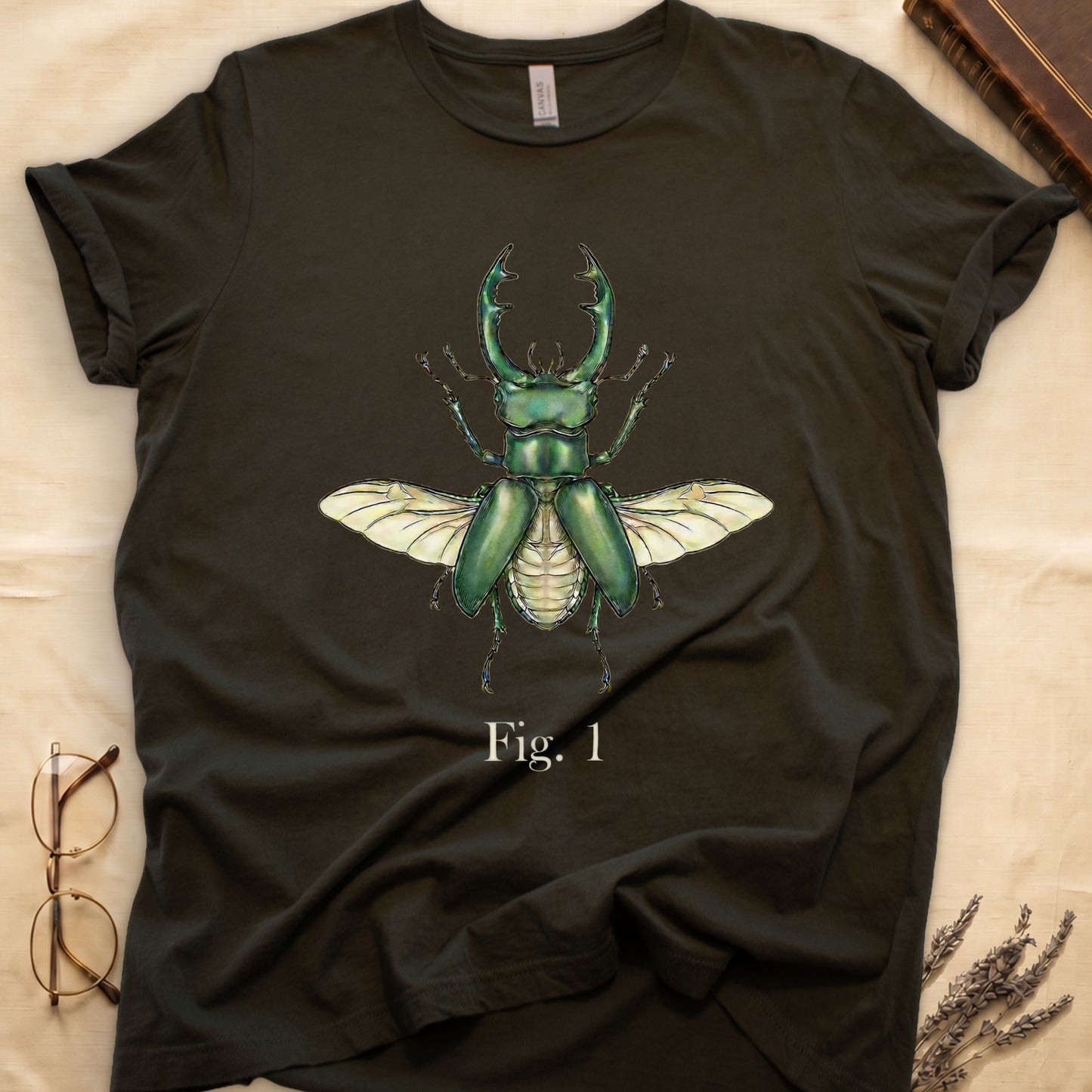 Dark t-shirt with a detailed green stag beetle illustration and "Fig. 1" text.