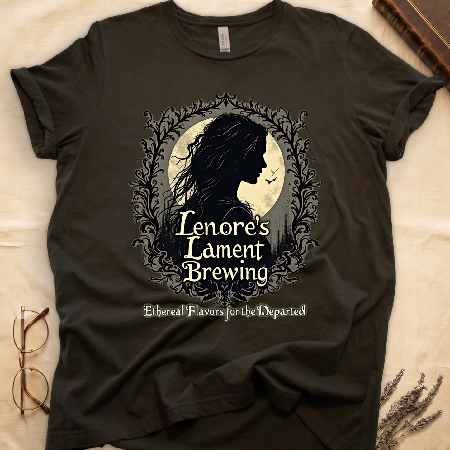 Military Green tee with sage label, Lenore silhouette and moon, "Lenore's Lament Brewing," "Ethereal Flavors for the Departed."