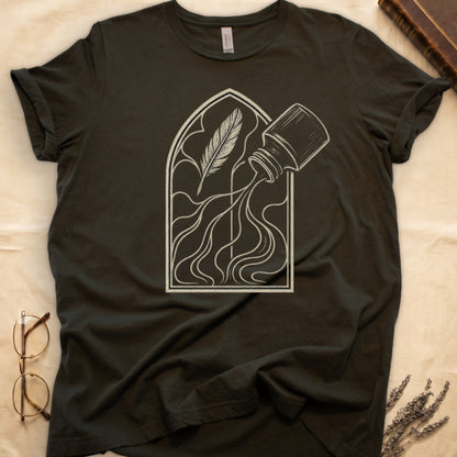 Military Green tee with sepia gothic arch, feather quill on left and tipped ink bottle on right spilling ink in curling tendrils.