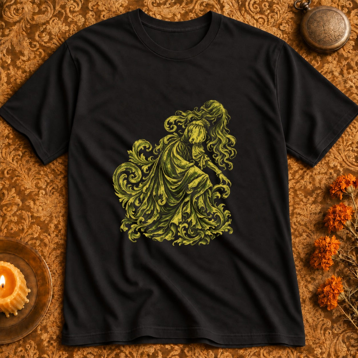 Black t-shirt with yellow ornate illustration of a woman and swirling vines.