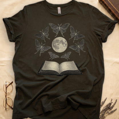 Military Green tee with full moon center, seven luna moths in halo around, open book below, cream-on-black engraving.