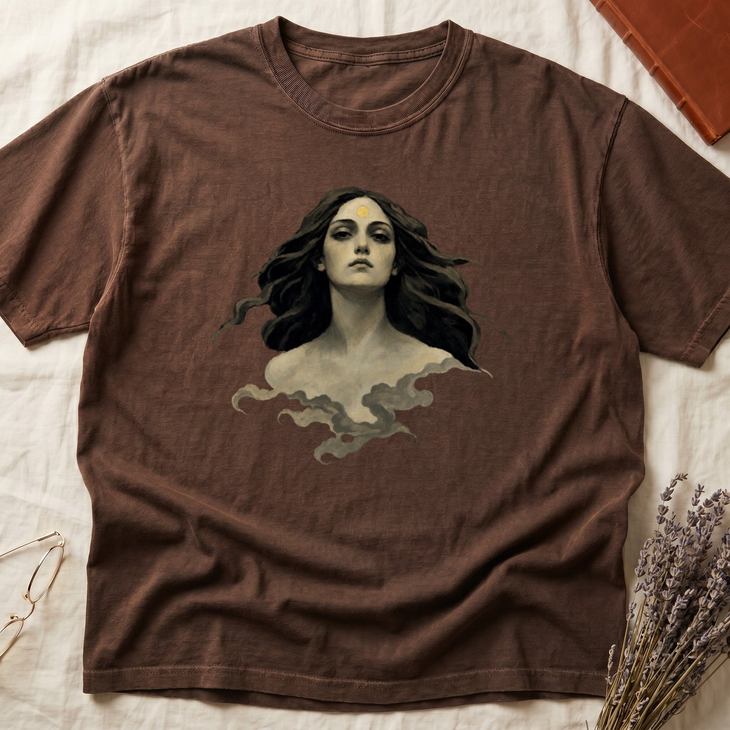 Brown t-shirt with a painted portrait of a woman with wavy dark hair.