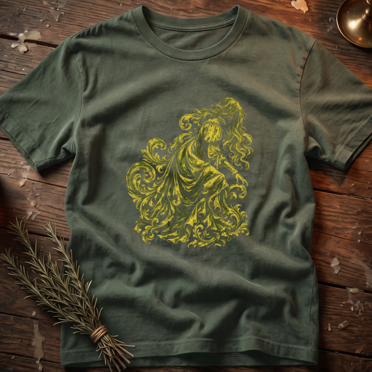 Green t-shirt with yellow rococo-inspired ornate floral design featuring a female figure.