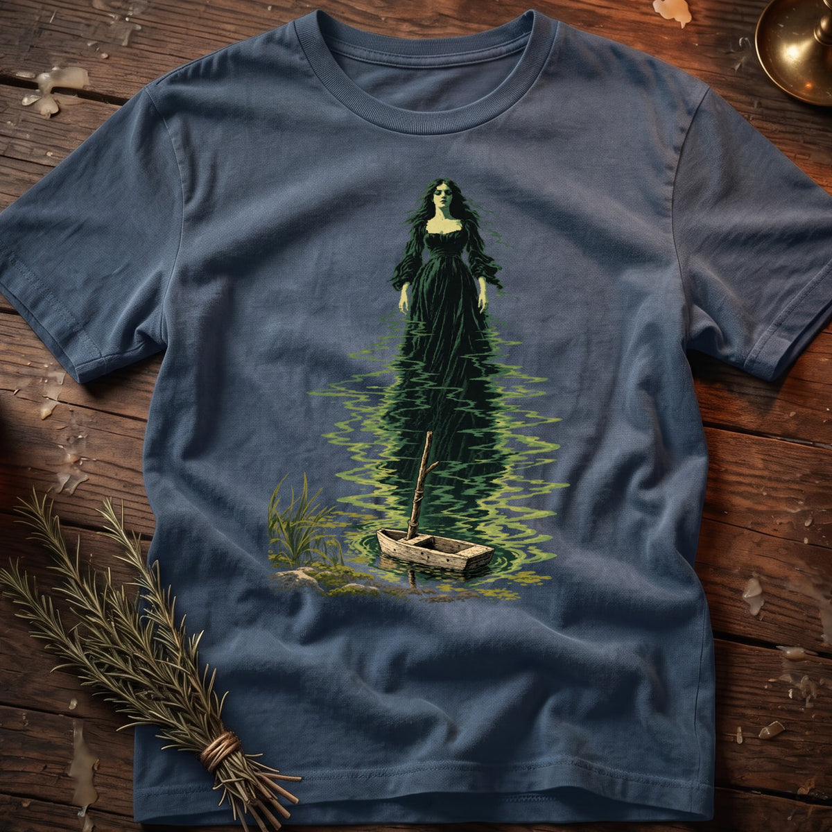 T-shirt with a dark green figure in water beside a small boat.