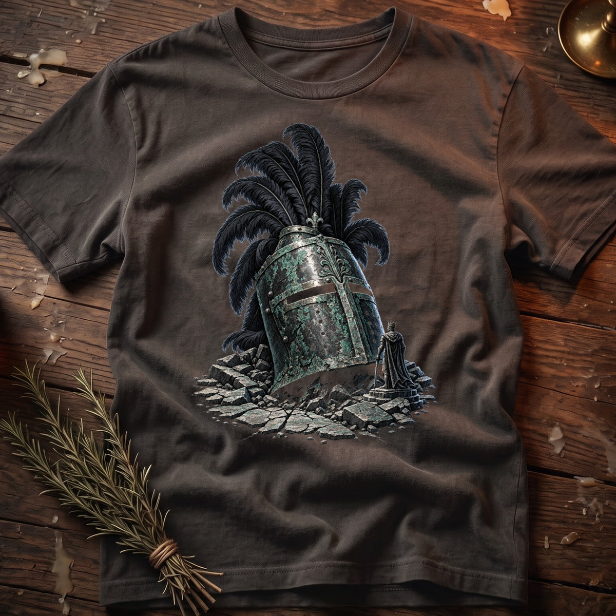 T-shirt graphic: weathered knight helmet with black feathers and a king figurine.