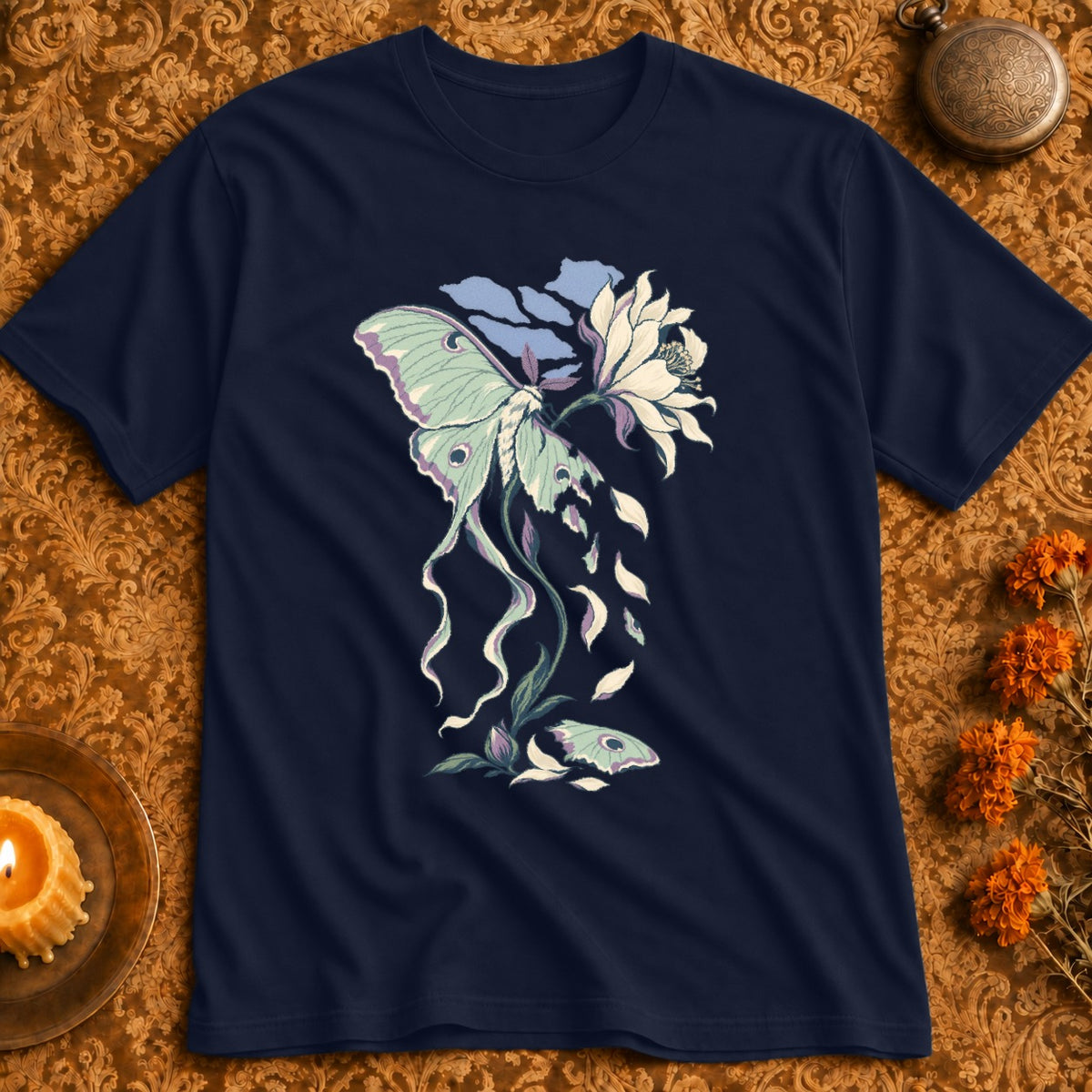Navy t-shirt with a light green luna moth and white flower design.