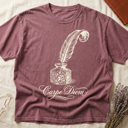 Dark Rose tee with ornate antique inkwell and quill pen in sepia linework, "Carpe Diem" in flowing cursive below.