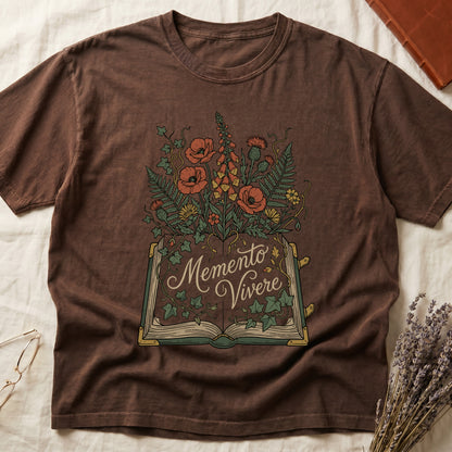 Espresso tee with open book and botanical illustration, red poppies, golden foxglove, ferns and ivy spilling from the pages.