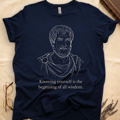 Navy tee with classical philosopher bust in cream linework, "Knowing yourself is the beginning of all wisdom" below.