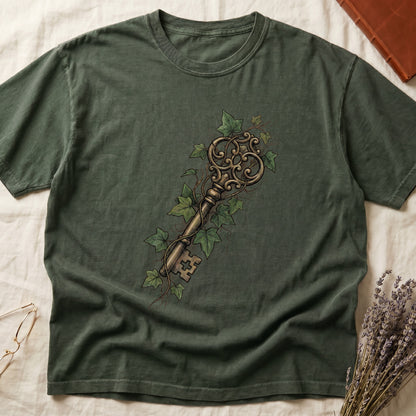 Green tee with ornate antique skeleton key in bronze, climbing English ivy in green on terracotta ground.