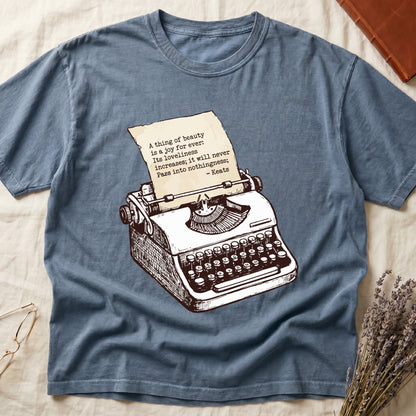 Blue Jean tee with vintage typewriter in cream linework, paper showing "A thing of beauty is a joy for ever" by Keats.