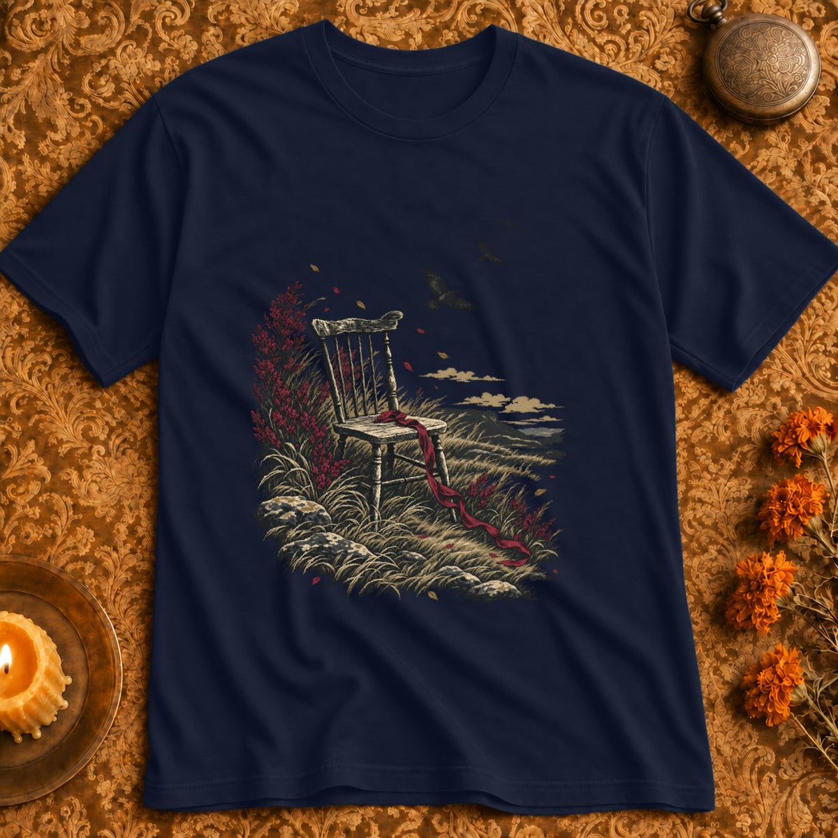 Wooden chair with red ribbon in a grassy field with two birds flying.