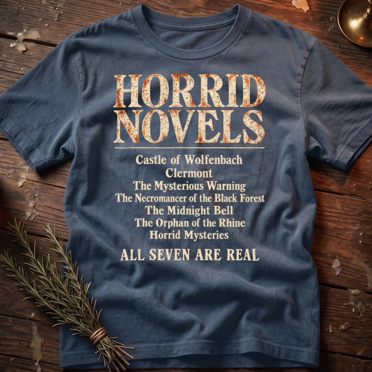 Blue t-shirt with "Horrid Novels" and a list of seven book titles.