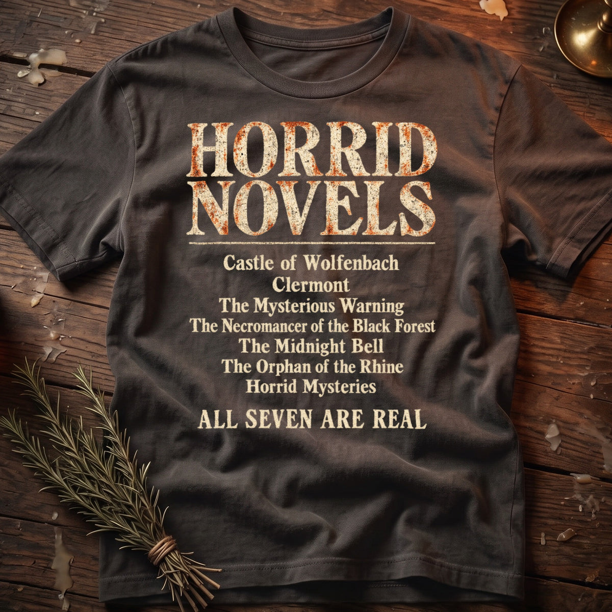 Dark gray t-shirt with "HORRID NOVELS" and a list of seven book titles.