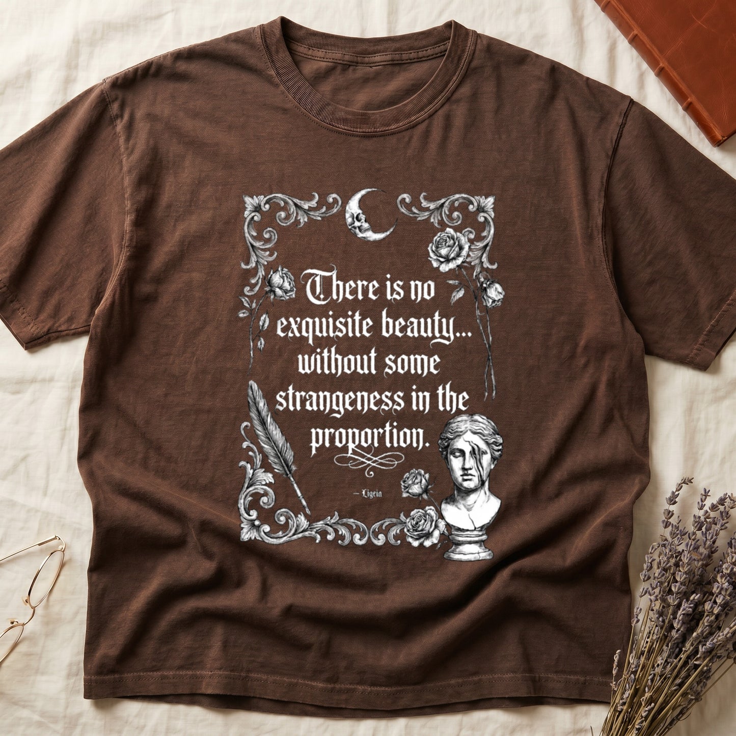 Brown t-shirt with text: "There is no exquisite beauty... without some strangeness in the proportion. - Ligeia"