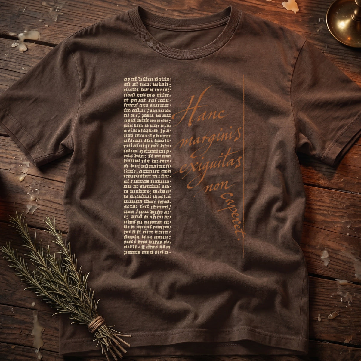 Brown t-shirt with white text in Old English font and orange script.