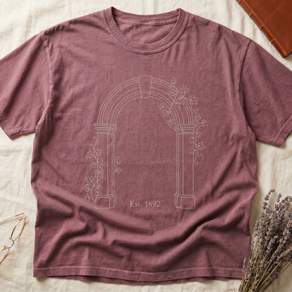 Dark Rose tee with Gothic stone archway in cream linework, ivy climbing the columns, "Est. 1892" inscribed at the base.