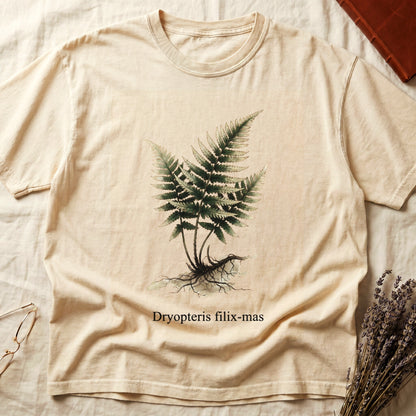 Ivory tee with Victorian fern illustration of Dryopteris filix-mas in greens with exposed root, italic Latin binomial below.